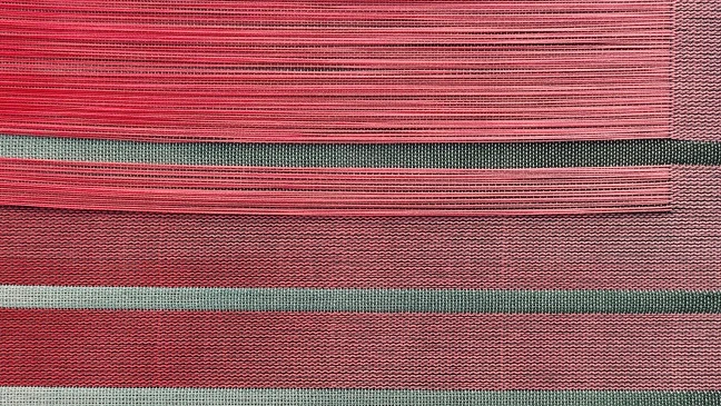 Detail von gewebten Stoff mit bunten Fänden