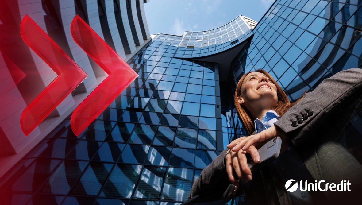Titelseite mit Bildhintergrund sowie den Worten Real People Real Passion Real Estate und UniCredit.